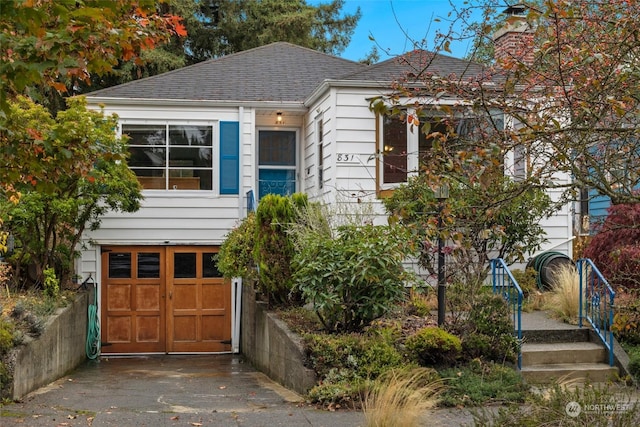 view of front of property featuring a garage