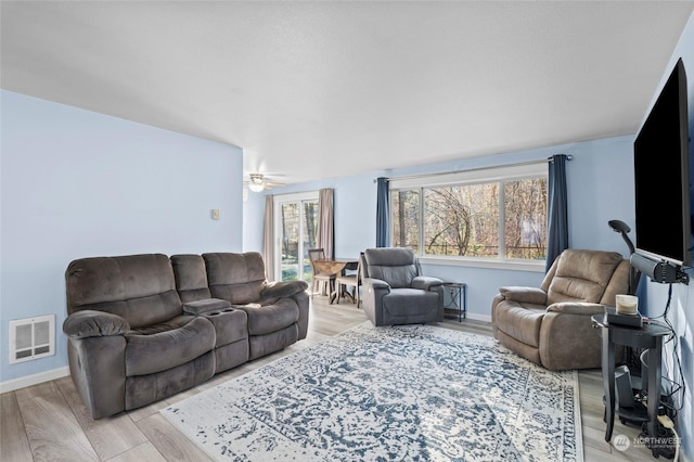 living room with light wood-type flooring