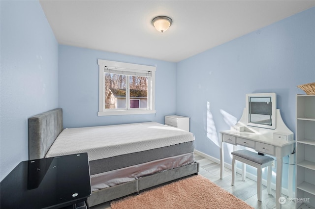 bedroom featuring light wood-type flooring