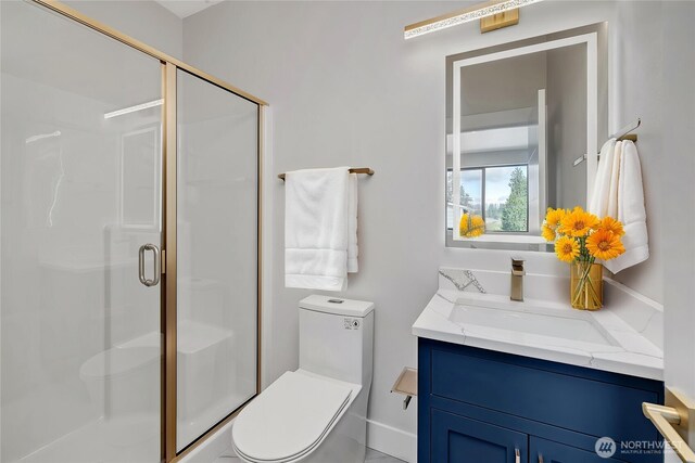 21402 E 39th Dr SE Unit A, Bothell, WA 98021 - bathroom featuring toilet, a shower stall, and vanity