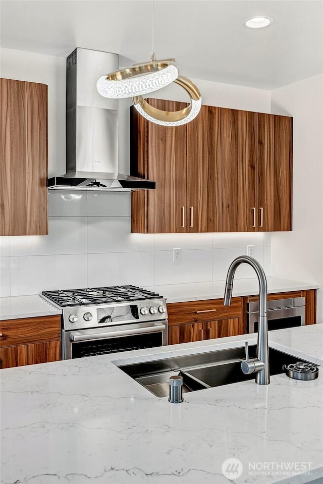21402 39th Dr SE Unit A, Bothell, WA 98021 - kitchen featuring wall chimney range hood, stainless steel gas range oven, brown cabinets, and modern cabinets