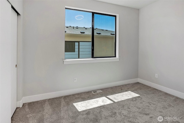 21402 39th Dr SE Unit A, Bothell, WA 98021 - carpeted spare room with baseboards