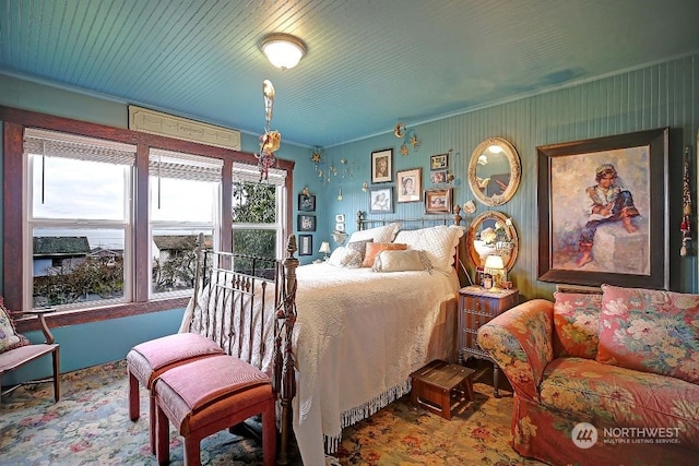 bedroom featuring crown molding