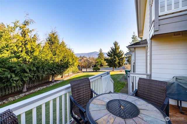 exterior space featuring a deck with mountain view