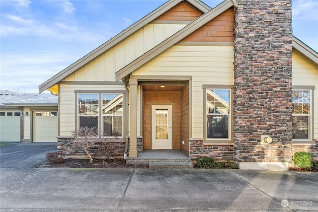 doorway to property featuring a garage