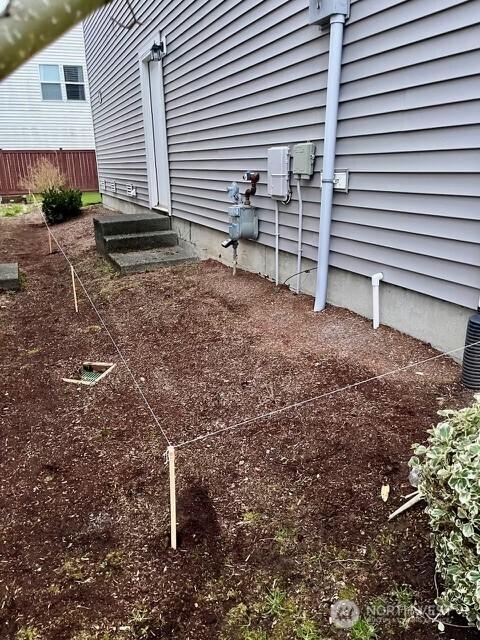 exterior details with entry steps and gas meter