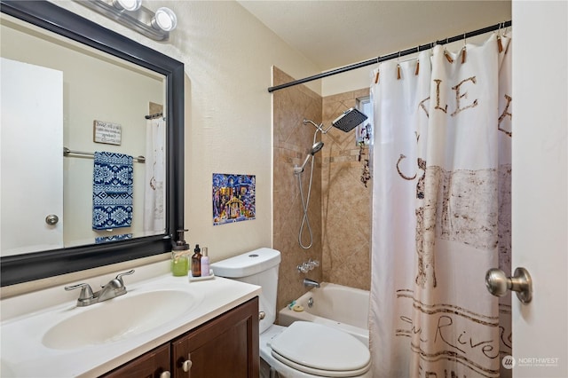 full bathroom featuring shower / bathtub combination with curtain, vanity, and toilet