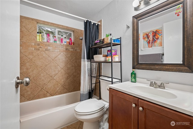 full bathroom with vanity, toilet, and shower / tub combo