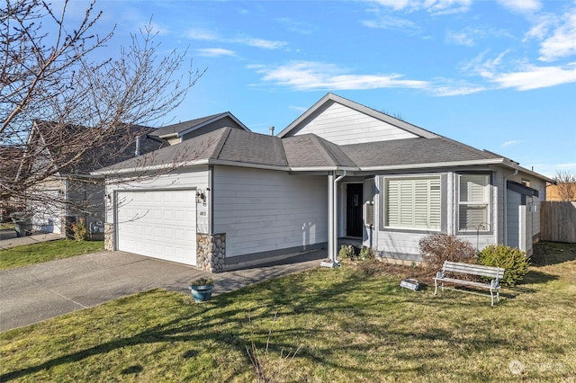 ranch-style house with a garage and a front lawn