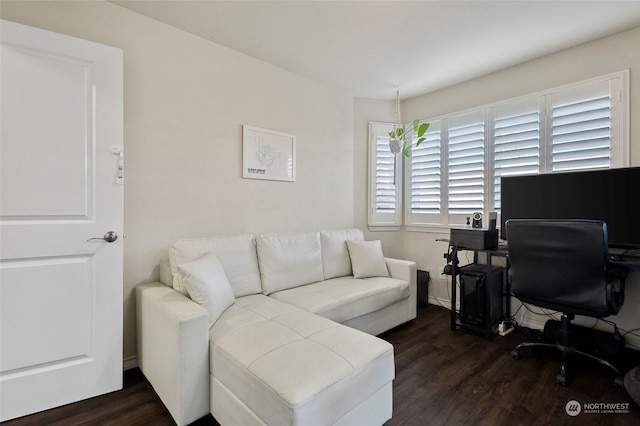 office space with dark wood-type flooring