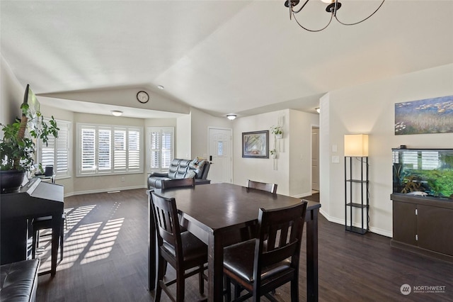 dining space with dark wood-type flooring and lofted ceiling