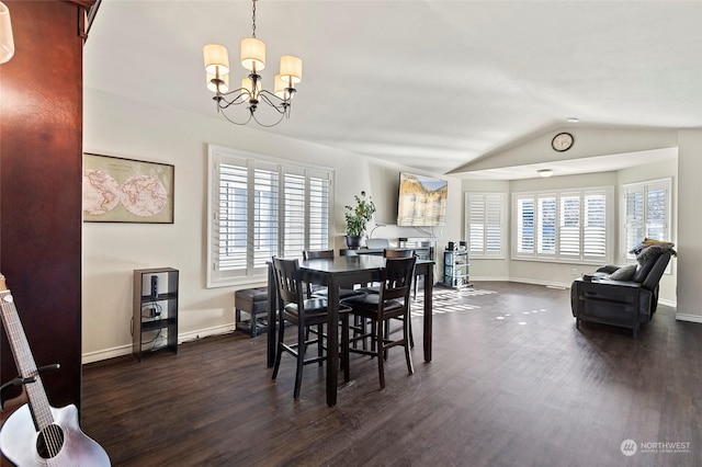 dining room with an inviting chandelier, vaulted ceiling, and dark hardwood / wood-style floors