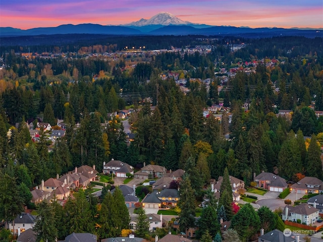 aerial view at dusk with a mountain view