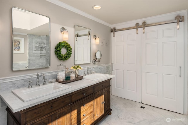 bathroom with vanity, crown molding, and a skylight