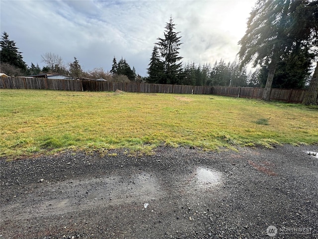 view of yard with fence