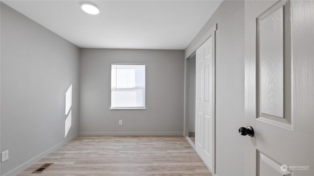 unfurnished bedroom with light hardwood / wood-style flooring