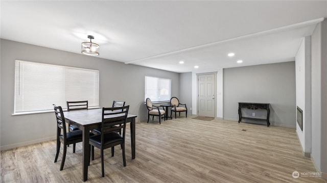 dining room featuring light wood-type flooring