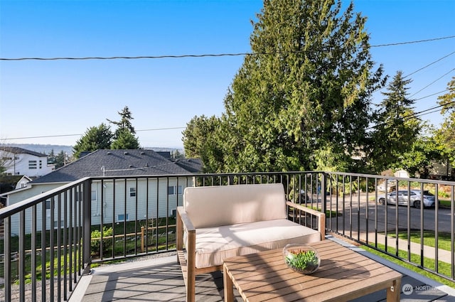 wooden deck with a grill