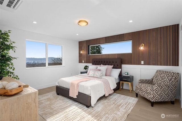 bedroom featuring light hardwood / wood-style floors