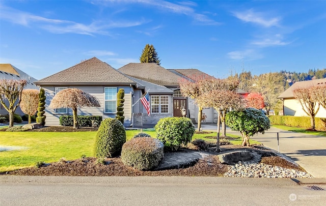 view of front of home with a front lawn