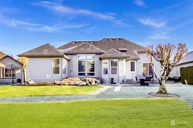 view of front of home with a front yard