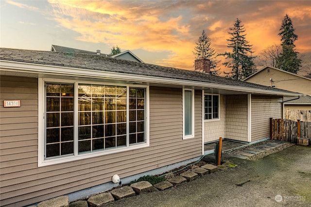 view of property exterior at dusk