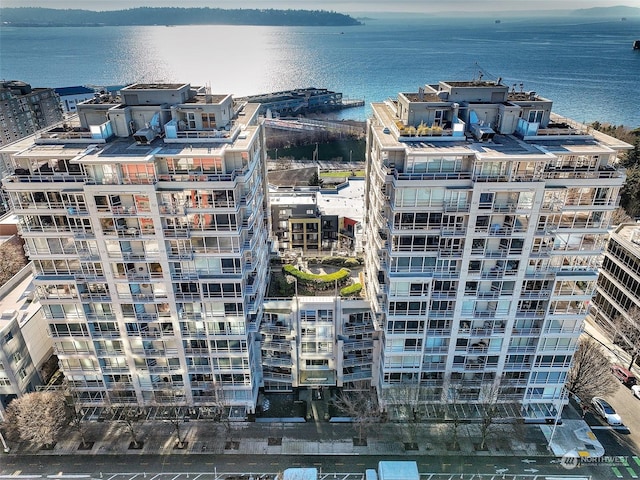 view of building exterior with a water view