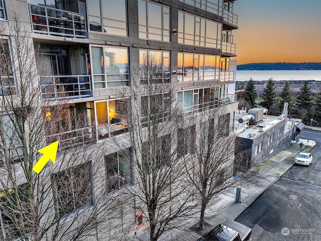 outdoor building at dusk with a water view