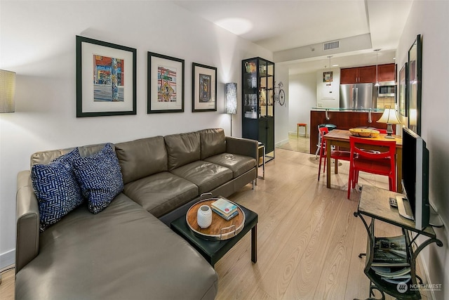 living room with light wood-type flooring