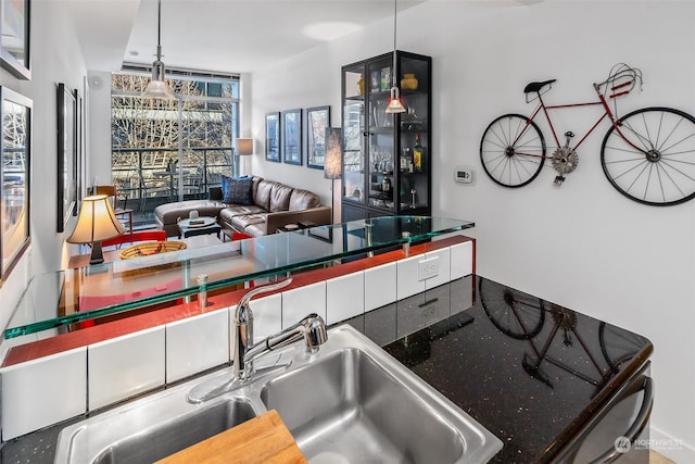 kitchen featuring sink and decorative light fixtures