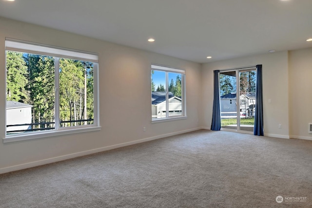 view of carpeted spare room