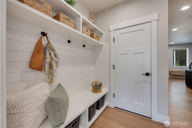 mudroom with recessed lighting and light wood finished floors