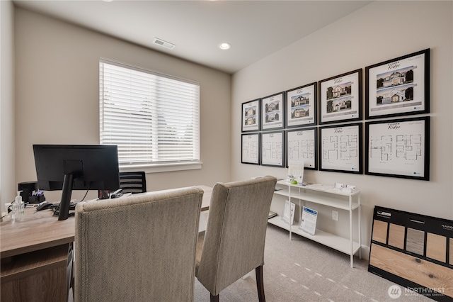 carpeted office with visible vents and recessed lighting