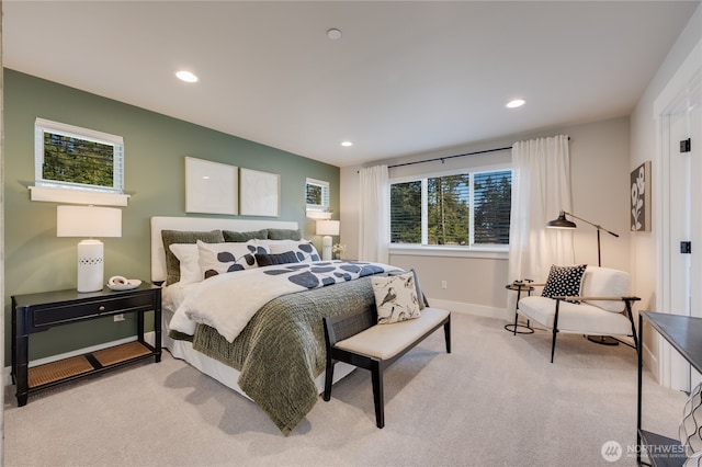 bedroom featuring recessed lighting, baseboards, and light colored carpet