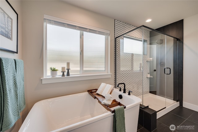 bathroom with tile patterned floors, a soaking tub, recessed lighting, and a shower stall