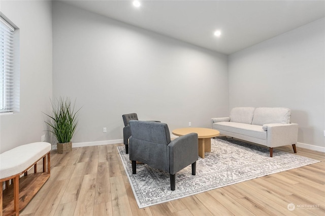 living area with light hardwood / wood-style floors