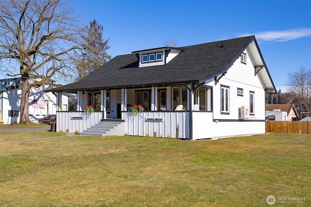 view of front of house featuring a porch and a front lawn