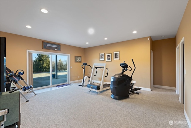 workout area with light colored carpet