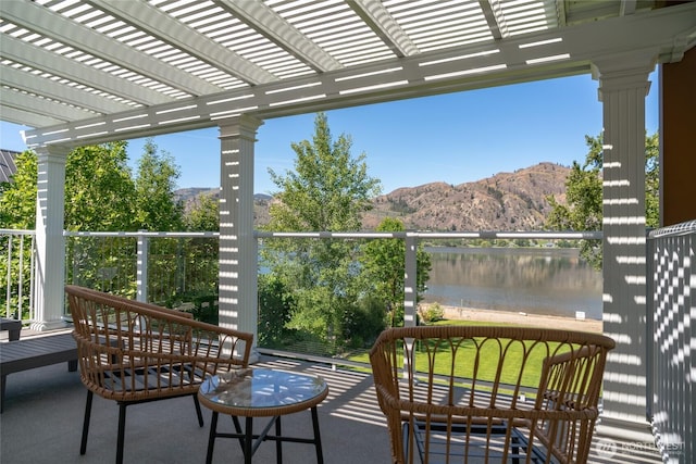 33 Hard Cider Dr, Oroville, WA 98844 - view of patio / terrace featuring a water and mountain view and a pergola