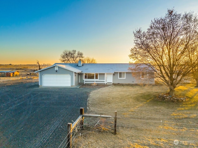 single story home with a garage