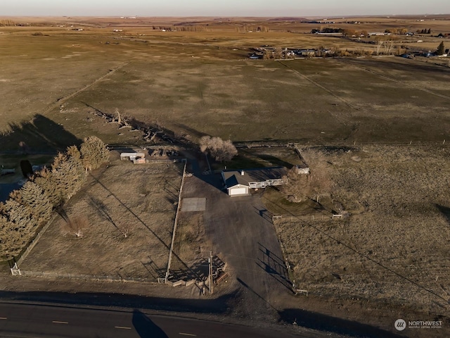 birds eye view of property featuring a rural view