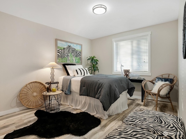 bedroom featuring light wood-type flooring