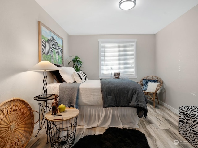 bedroom featuring light wood-type flooring