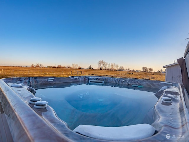 exterior details with a hot tub