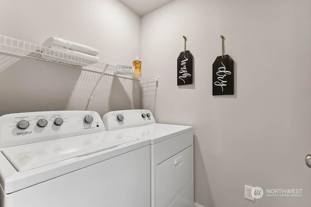 clothes washing area featuring washing machine and clothes dryer