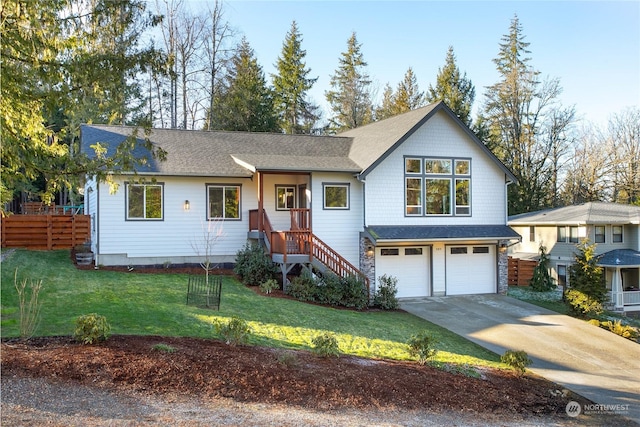 view of front facade featuring a garage and a front yard