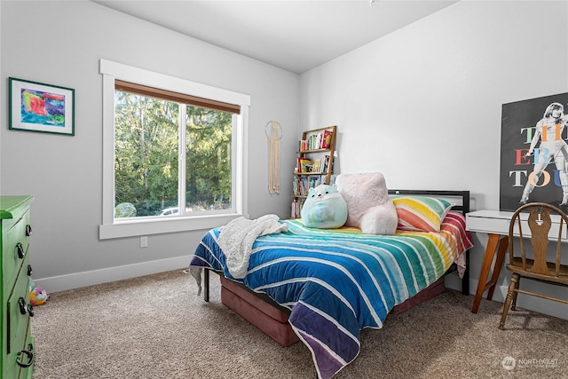 bedroom featuring carpet