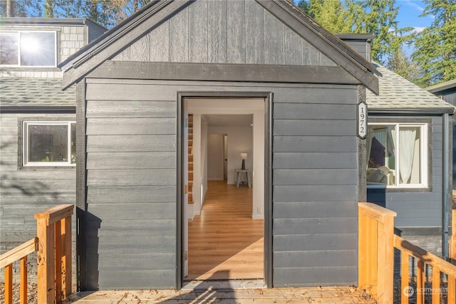 property entrance with a deck