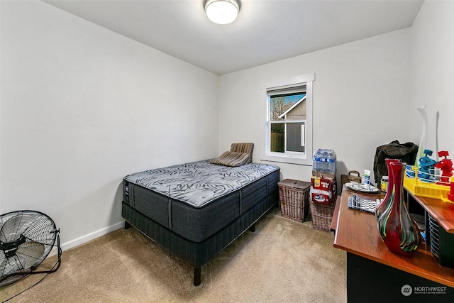 bedroom with light colored carpet