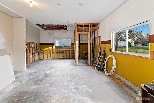 miscellaneous room with concrete flooring